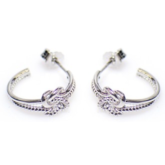 Mattenklopper oorbellen creolen | Surinaamse oorbellen